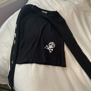 Black waffle long sleeve with metallic skull sleeves!